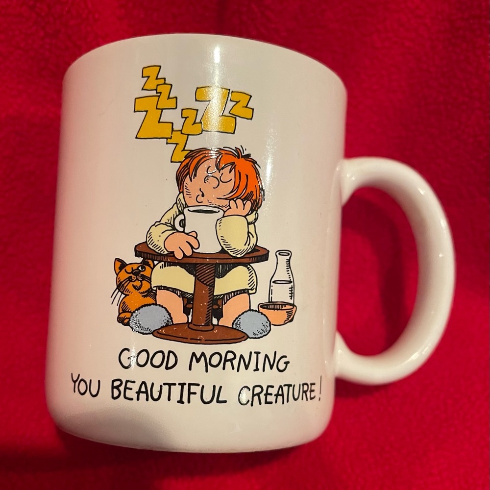 White Ceramic Mug with Cartoon Design